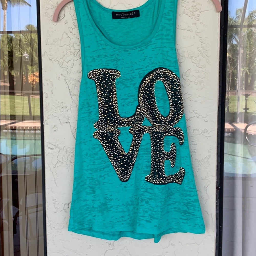 Hot tank top that has gold stones